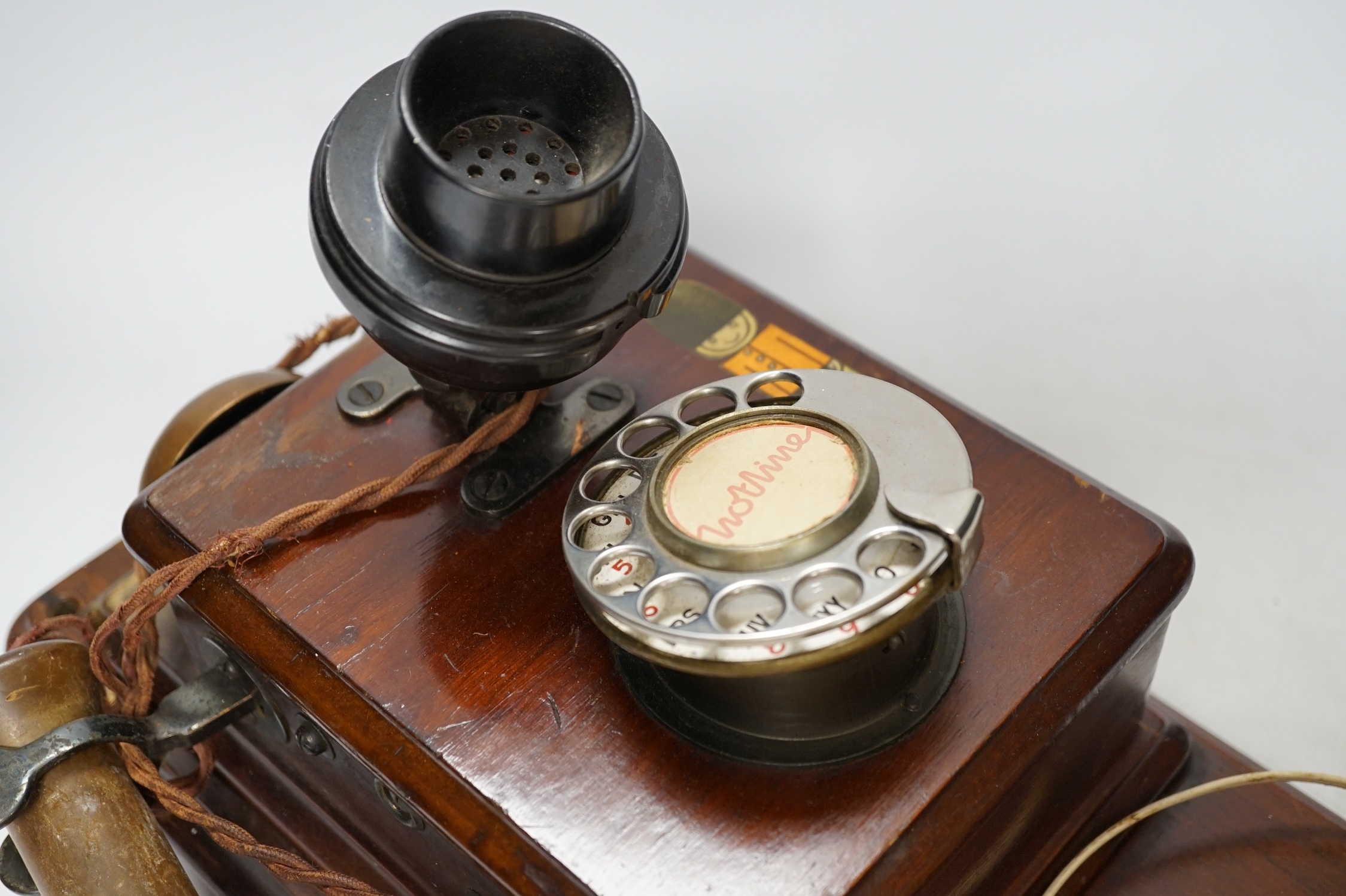 An early 20th century Hotline wall mounted telephone, 47cm long. Condition - fair
